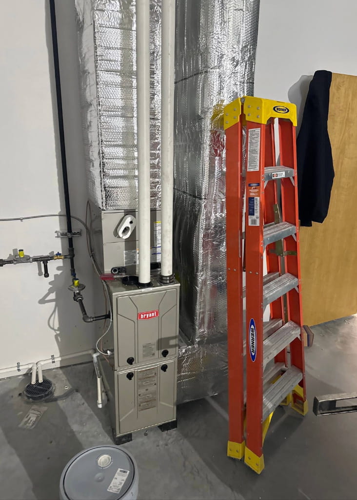 Indoor furnace and ductwork installation for reliable heating, airflow, and HVAC system performance.